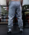 CORE JOGGERS OVERSIZE GRAY MELANGE - zdjęcie tył